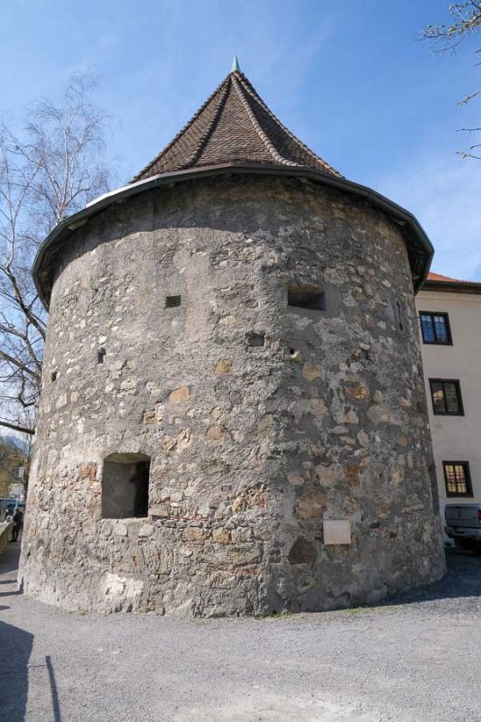 old stone tower with pointed roof