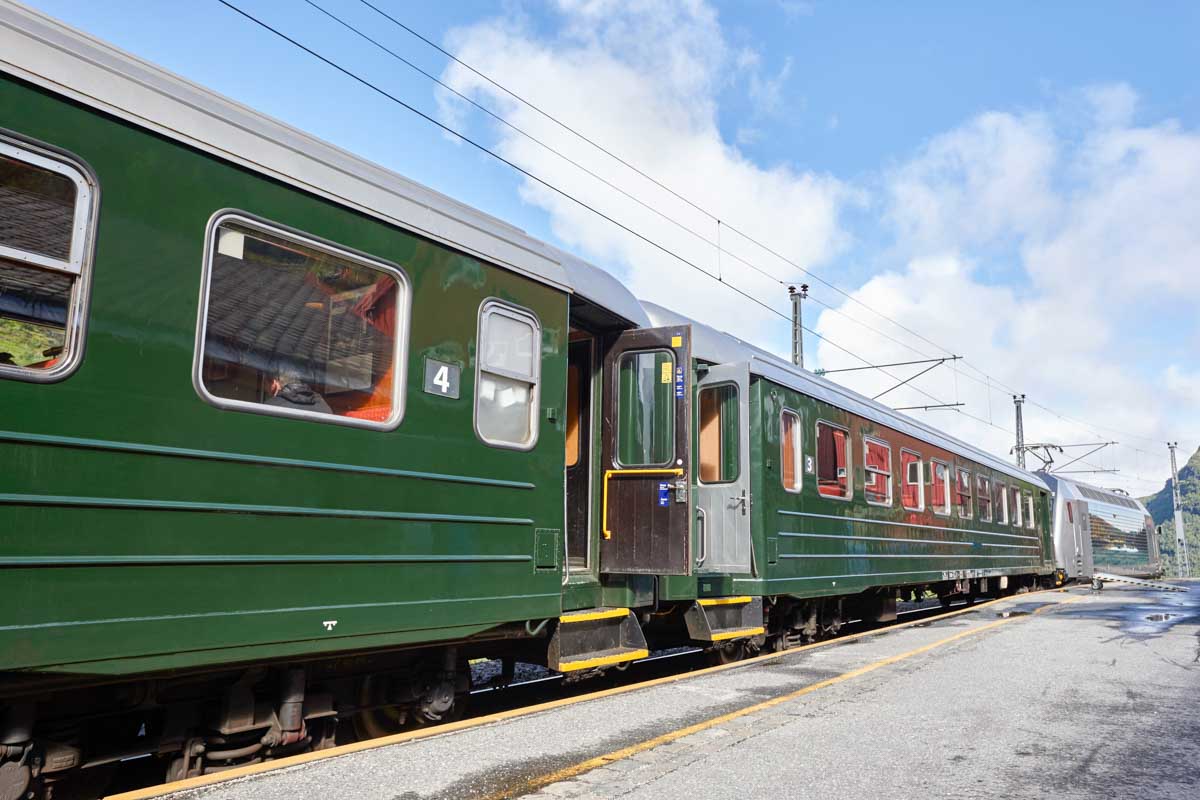 green train carriages of flam railway