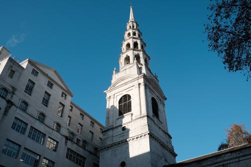 Church steeple under blue sky