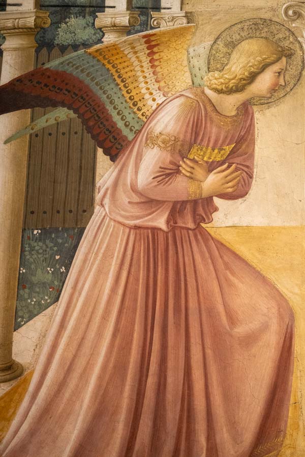 a kneeling angel from a painting in san marco florence