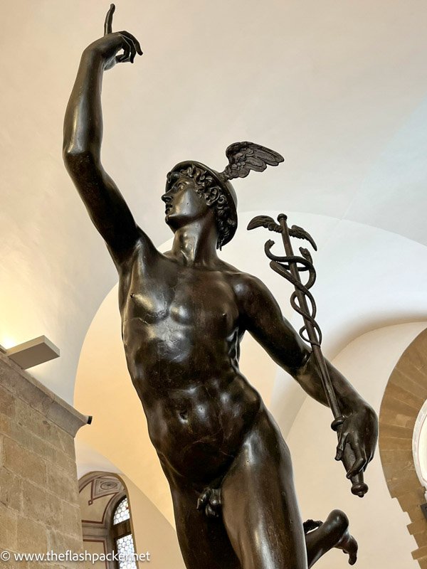 bronze statue of the animated figure of mercury