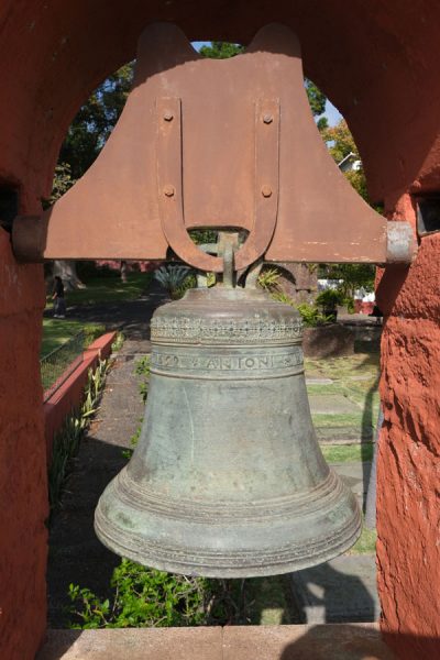 engraved iron bell in bell tower