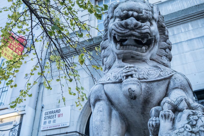 sculpture of lion and sign for gerrard street