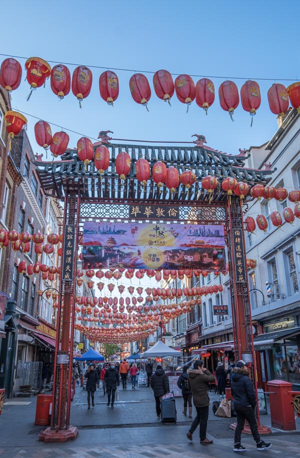 red gateway and chinese lanterns in gerrard street in london