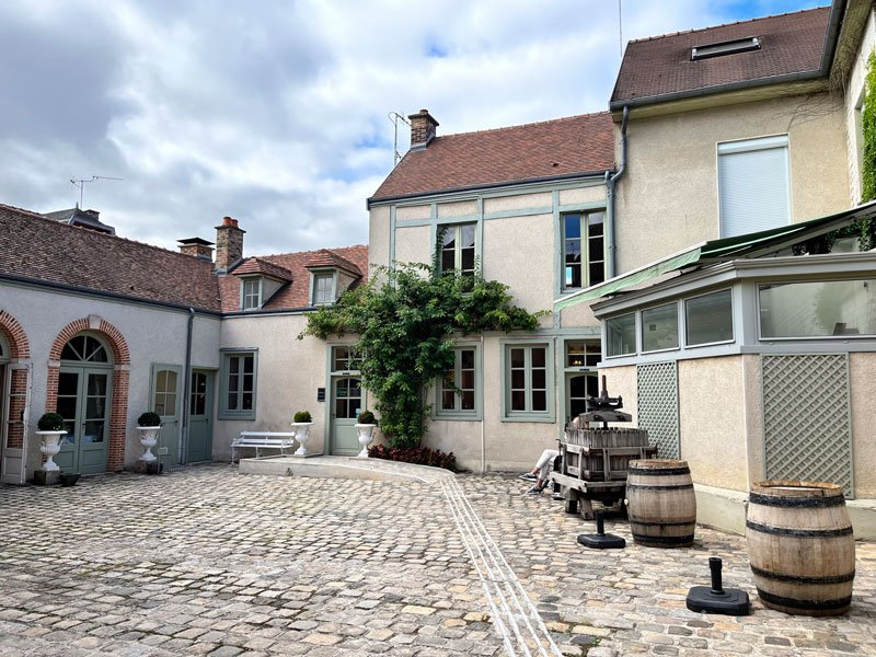 courtyard and building of g h martel champagne house in reims france