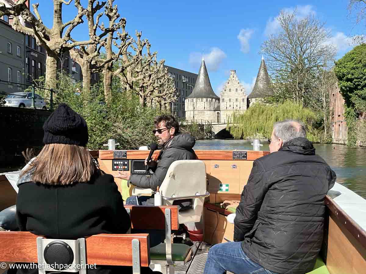 people on a canal boat tour on a sunny day