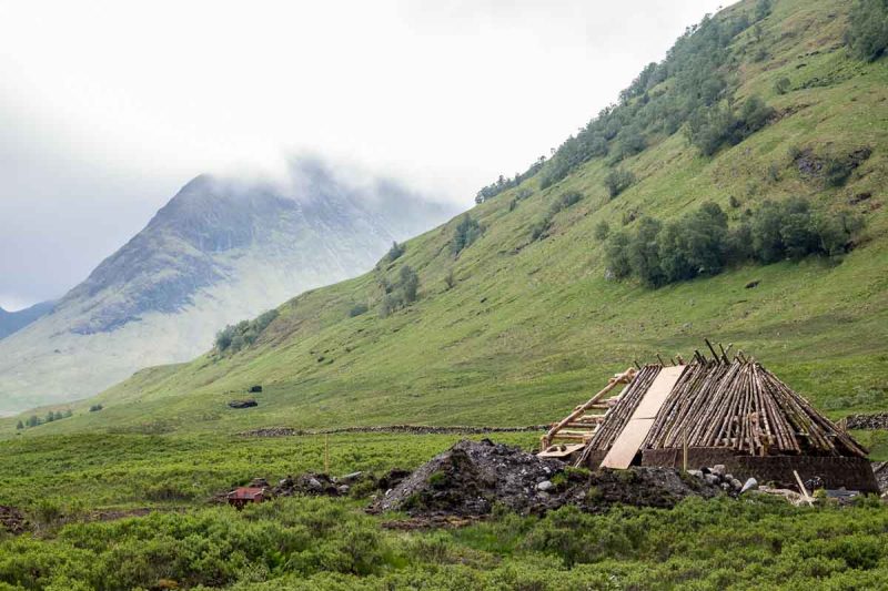 rolling landscape with misty mountains