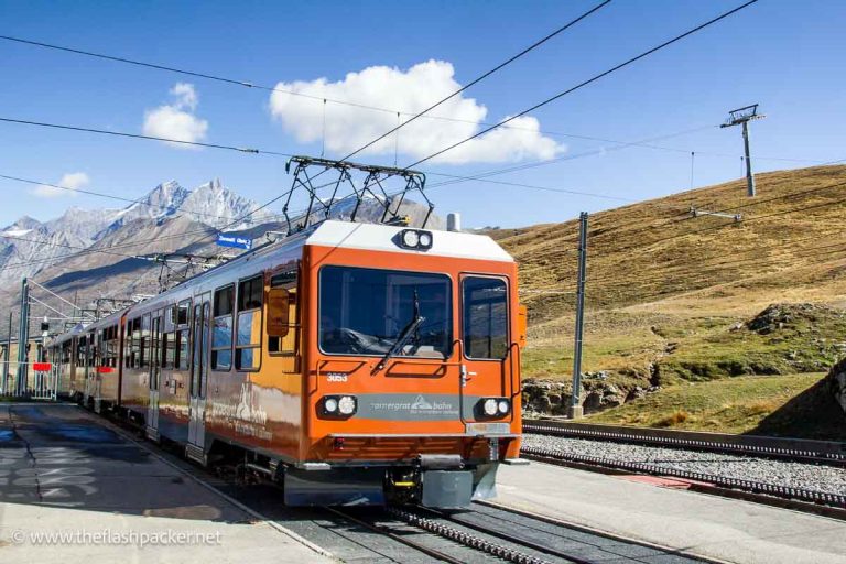 orange gornergrat railway train