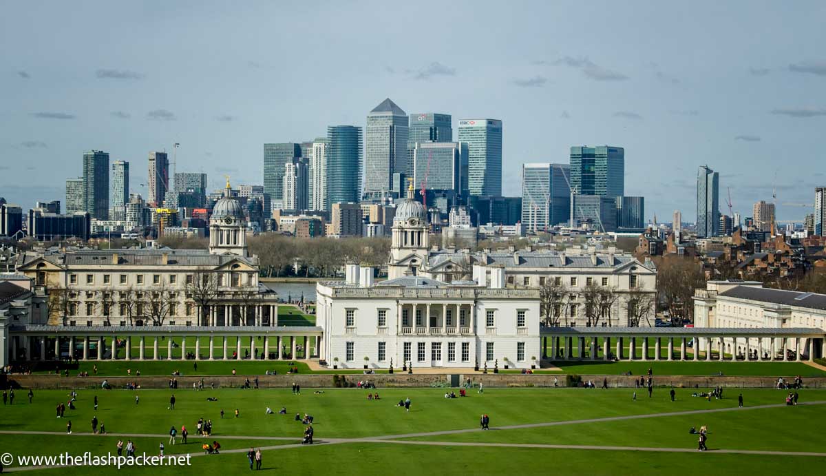 panoramic view of park fronting neoclassical buildings and skyscrapers in background