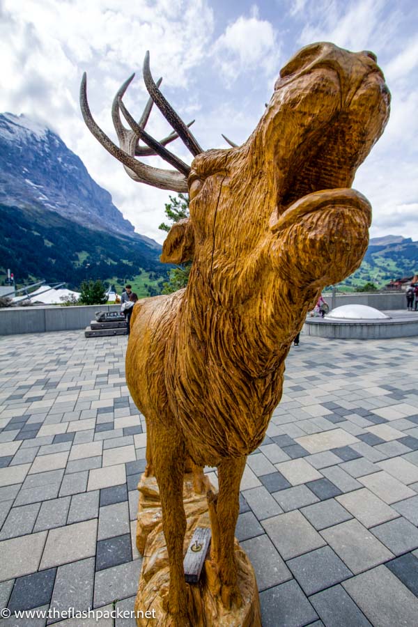 wooden sculpture of a moose