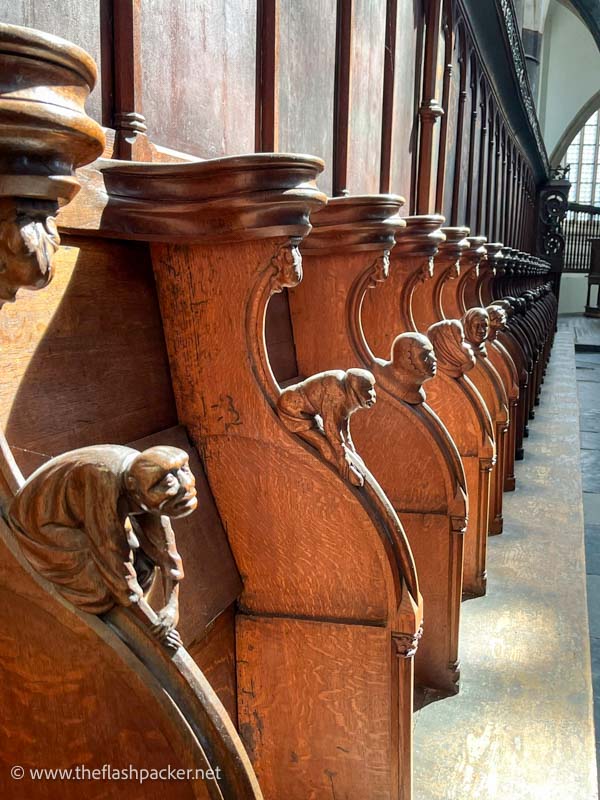 carved wooden figures on choir stalls