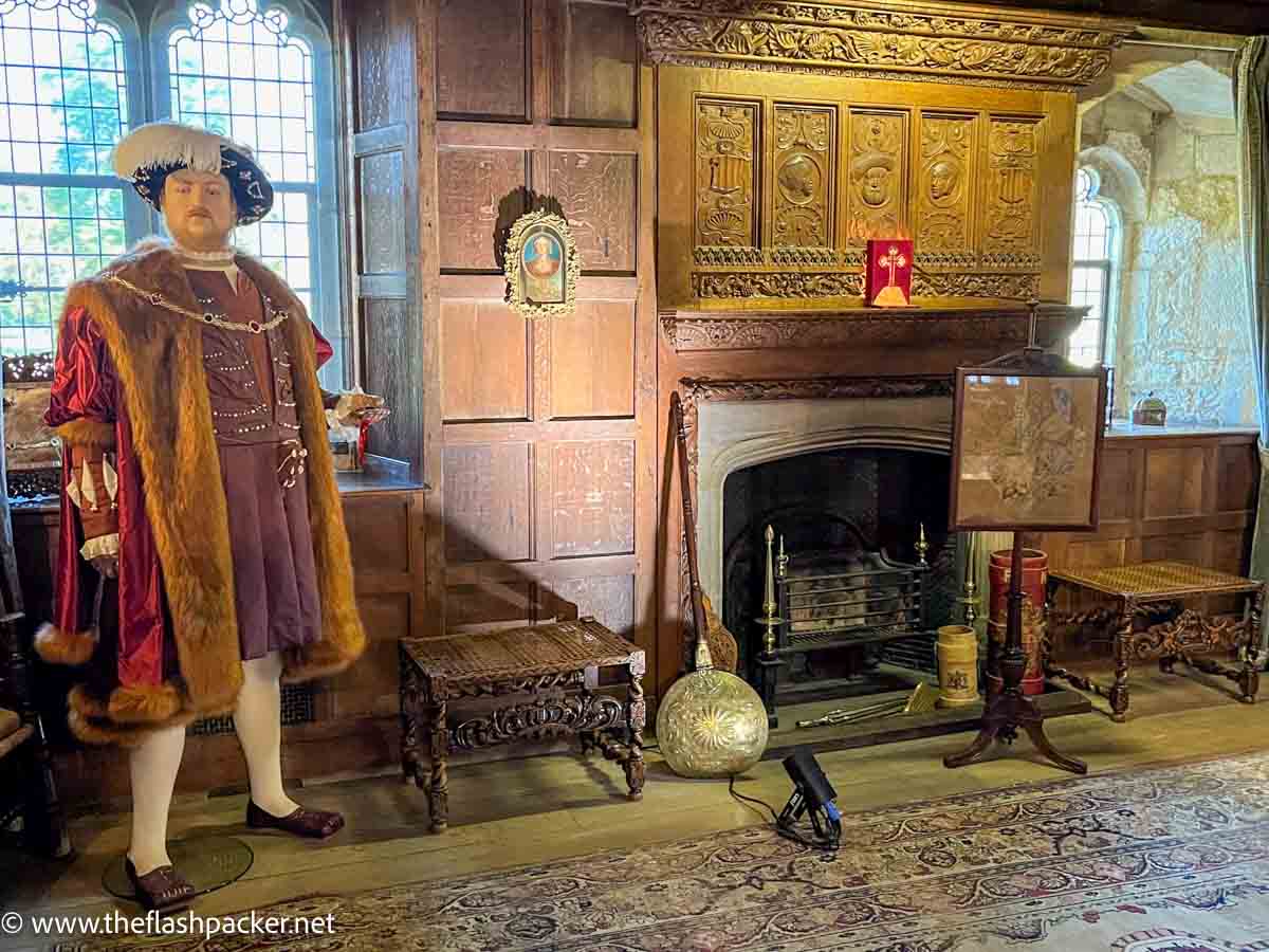 life size model of henry VIII in a room at hever castle