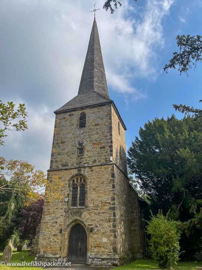 entrance to hever church with tall spire