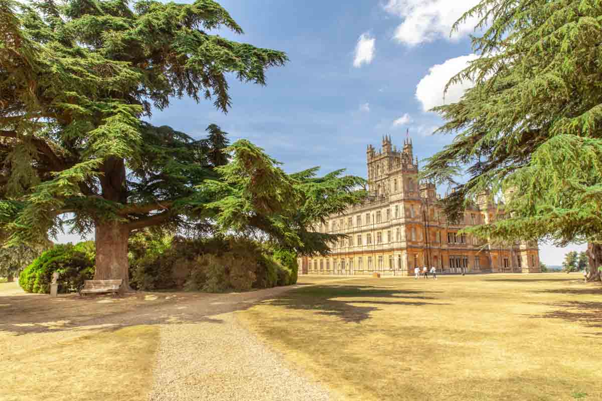 exterior of a grand stately home on a sunny day