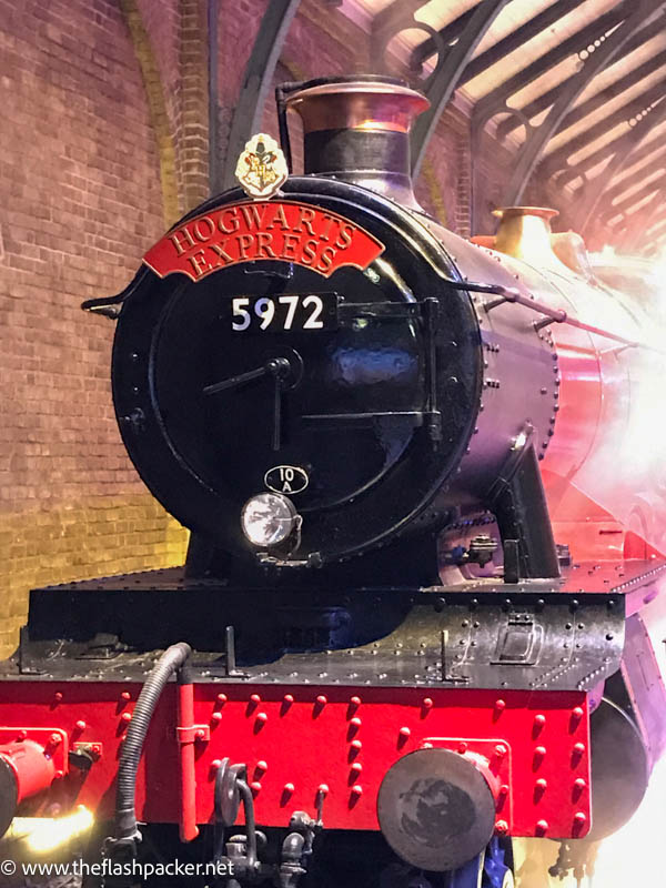 red and black hogwarts express steam train