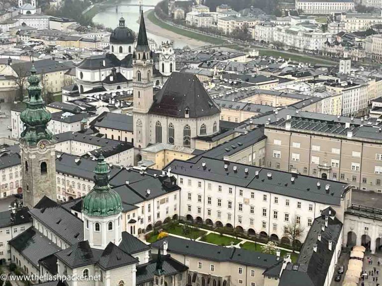 aerial view of rooftops of salzburg with river in background