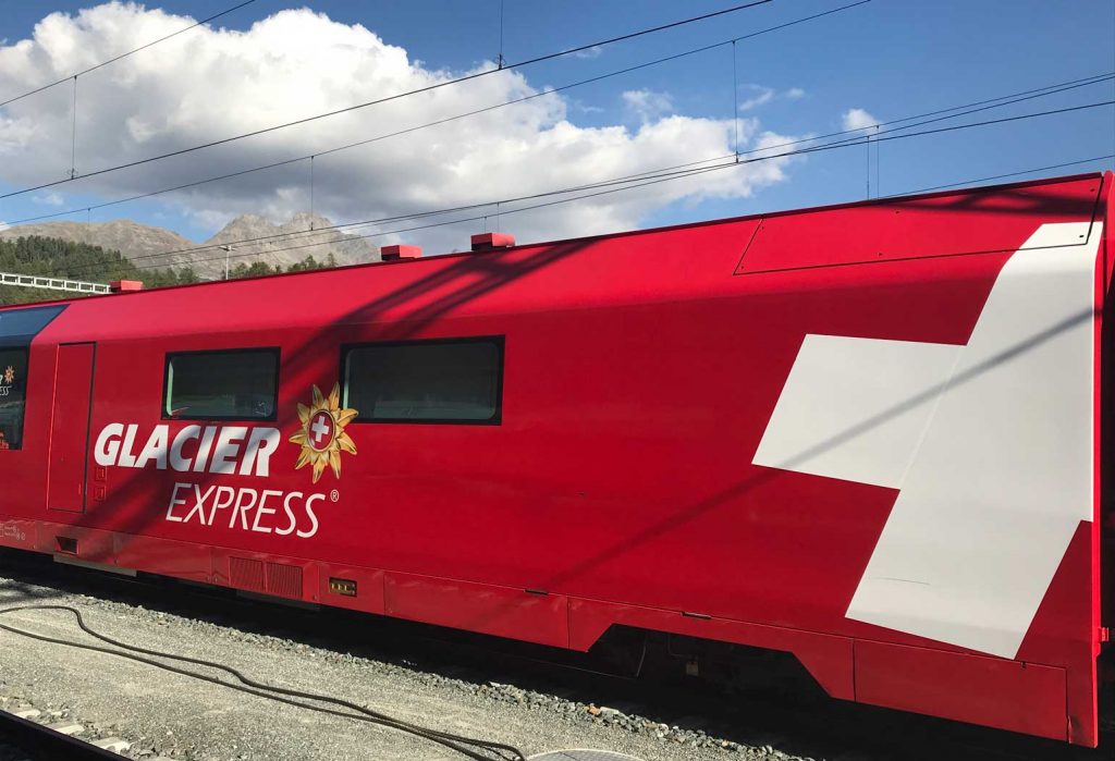 red and white glacier express train