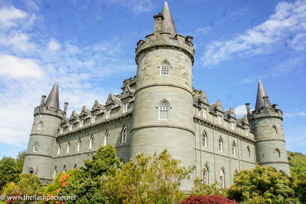 turrets of grey stones of inveraray castle in scotland