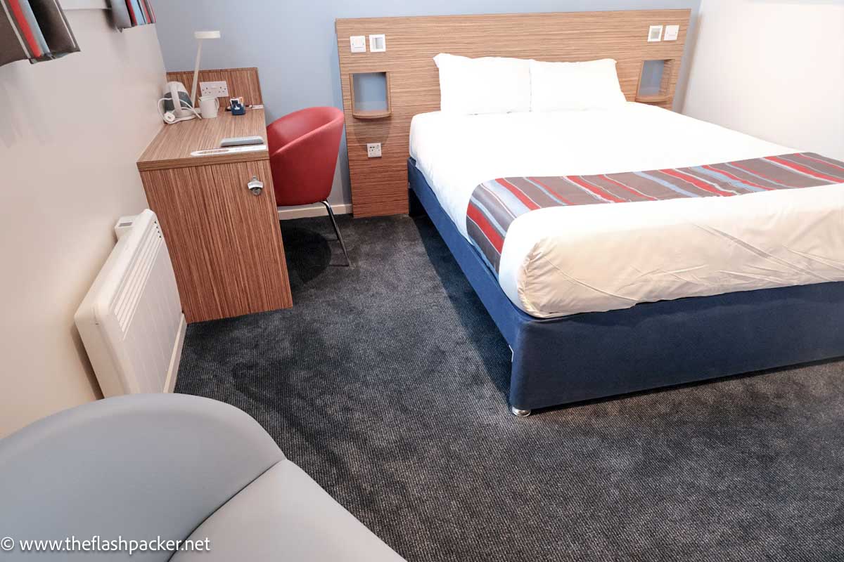 room at Travelodge Inverness City Centre with bed and desk which may be the best cheap hotel in inverness