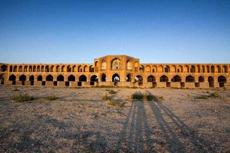 ancient bridge in isfahan at dusk