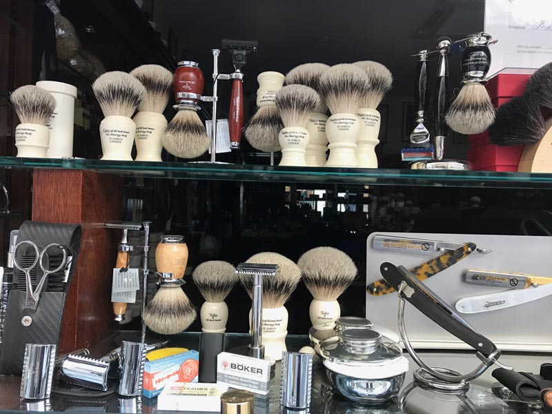 shop window of londons jermyn street with gentlemen's shaving accessories