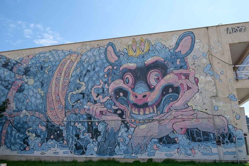 street art in kosice of a sea creature wearing a crown