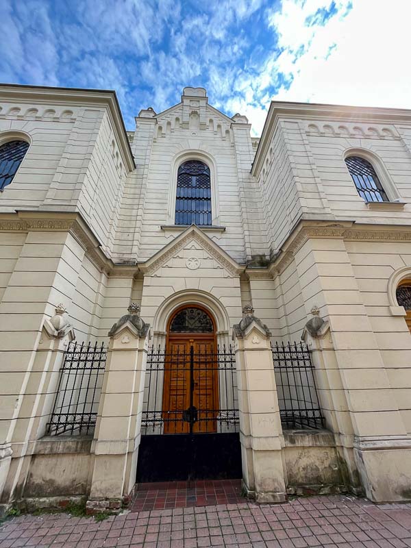 cream brick exterior of old synagogue in kosice