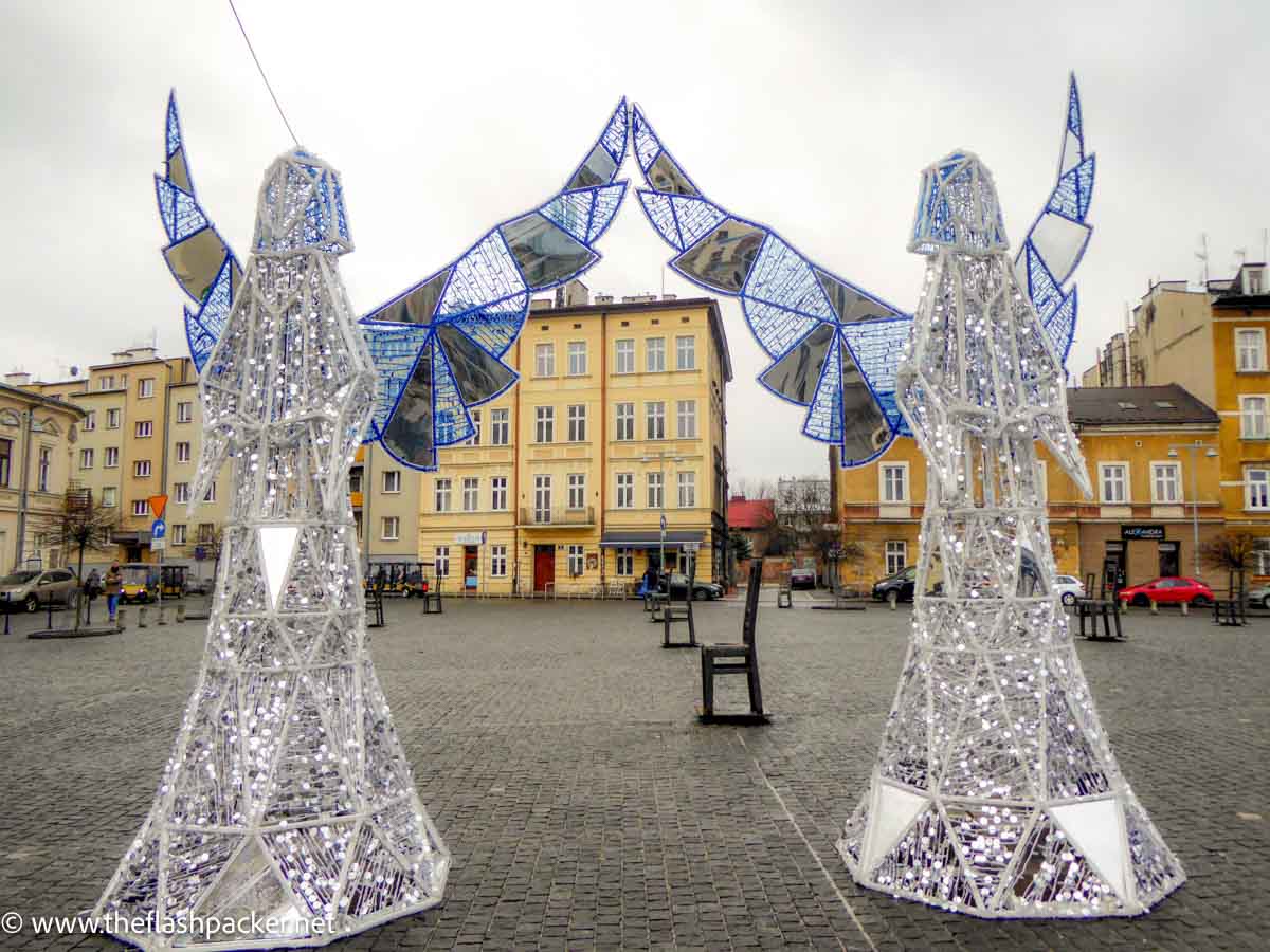 angels as xmas lights in square in krakow poland