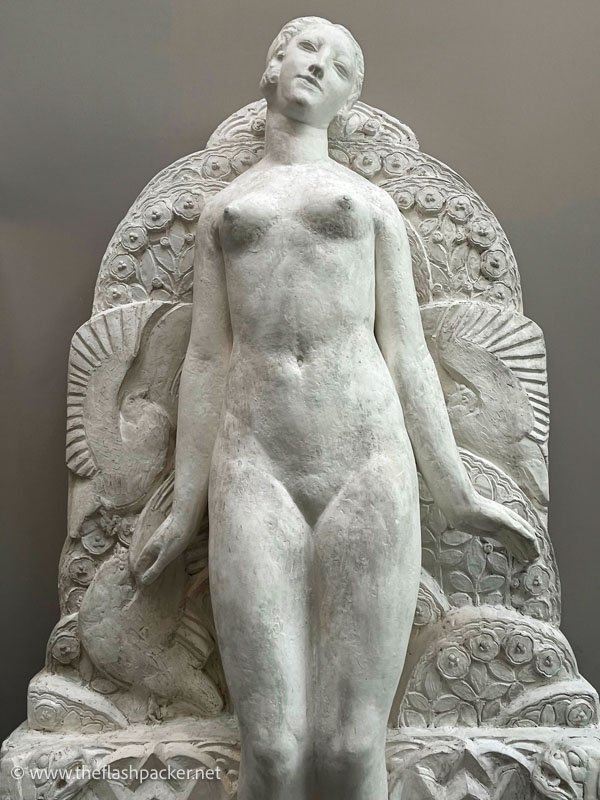 stone sculpture of a naked woman