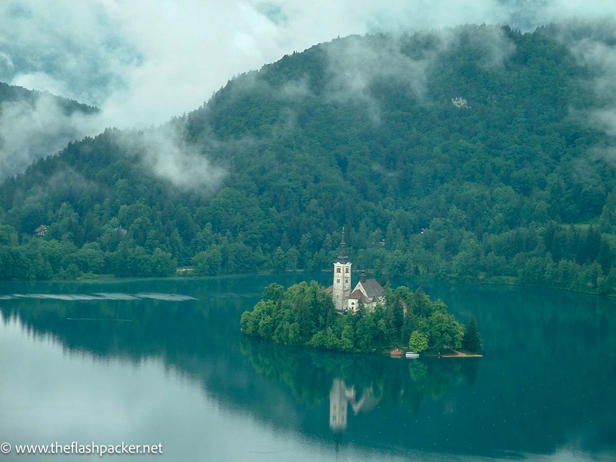 church on an island in the middle of lake bled slovenia