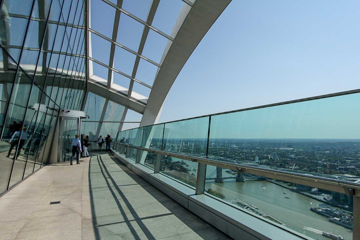 outdoor terrace of sky garden london overlooking the river thames