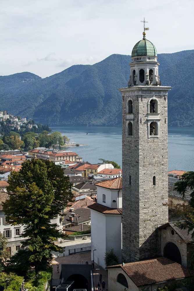 church bell tower by lake