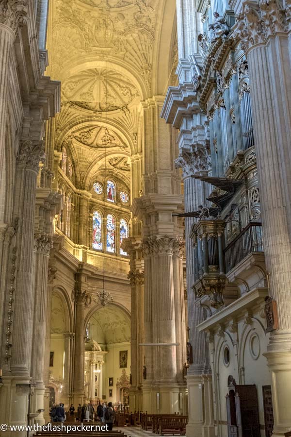 dimly lit nave of cathedral