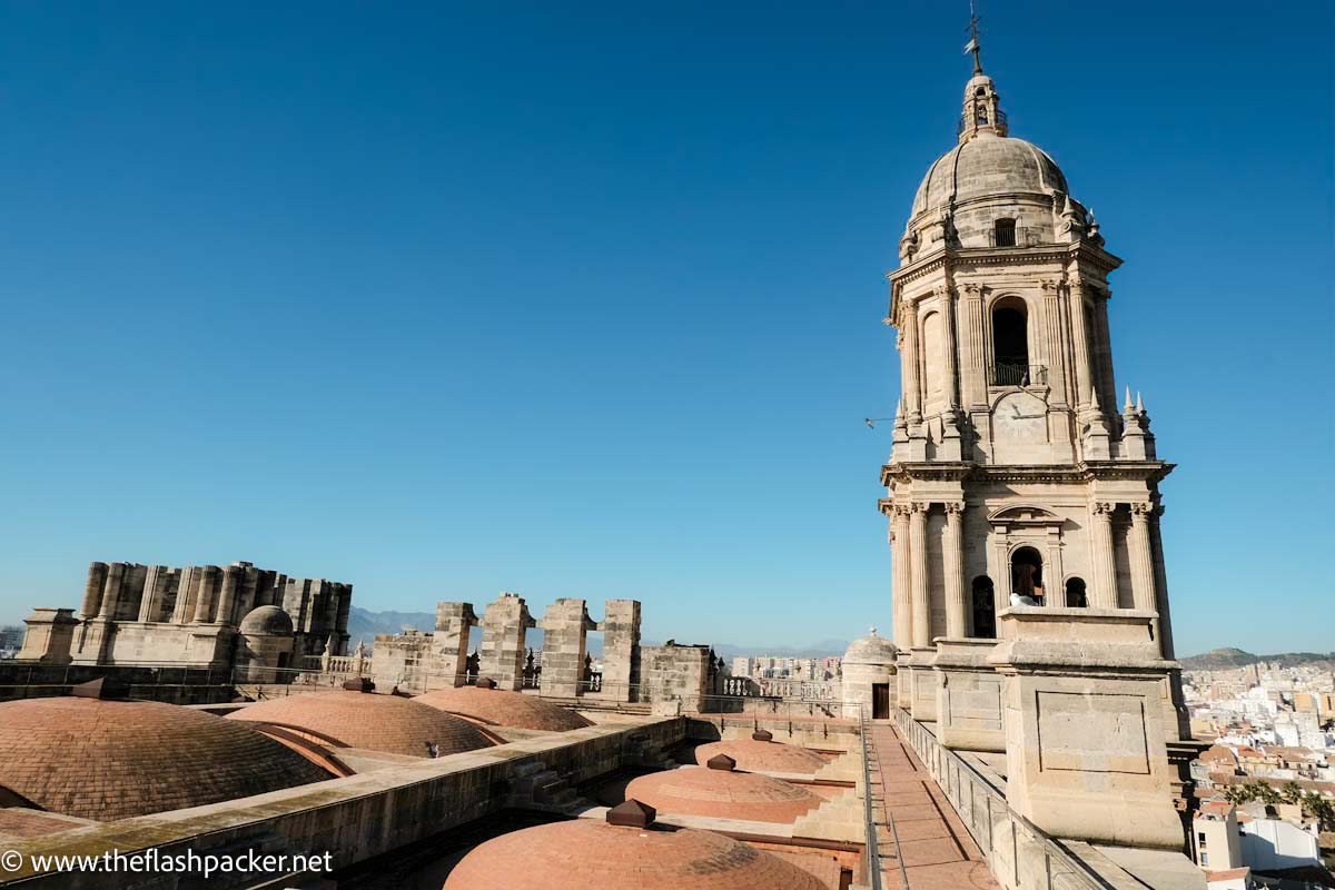 domed rooftop of malaga cathedral and church tower