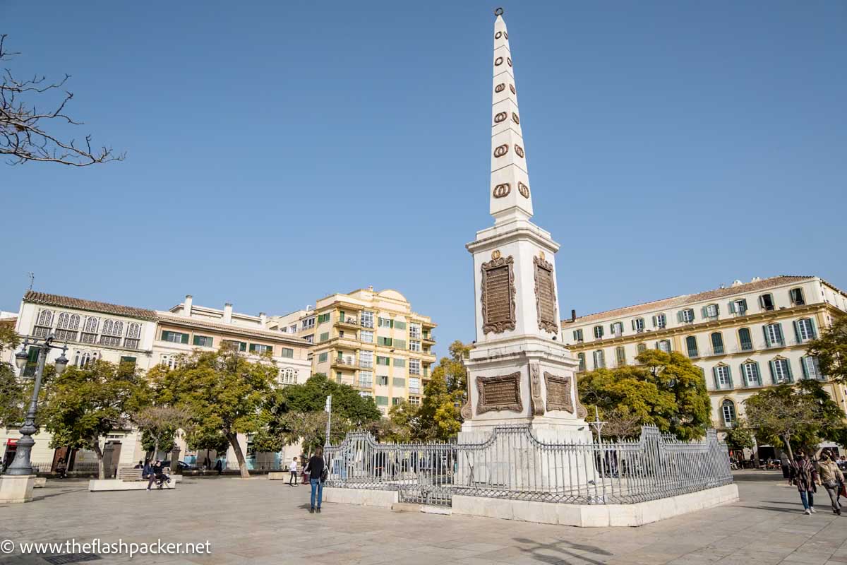 large plaza with obelisk monument in centre