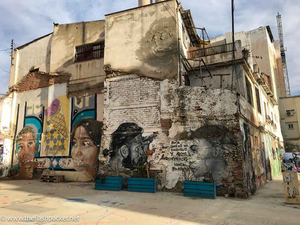 street art covering the wall of a ruined building in malaga spain