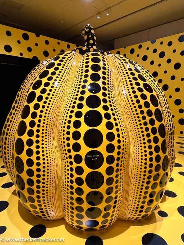 giant ceramic yellow pumpkin with polka dots