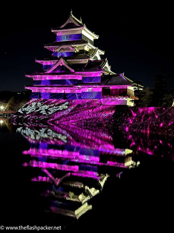 MATSUMOTO CASTLE ILLUMINATED IN PURPLE LIGHTS