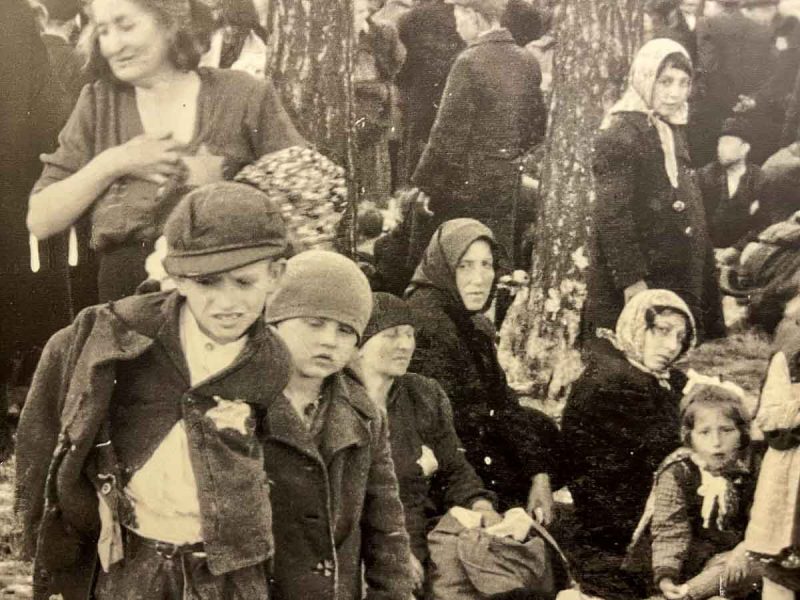 black and white photo of a group of jewish deportees