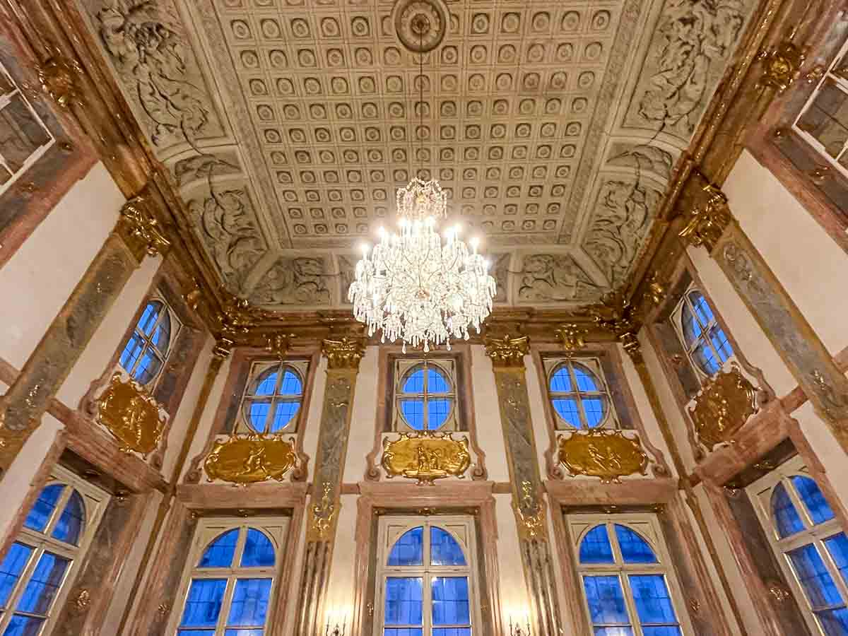 orante gilded interior of mirabell palace in salzburg with chandelier