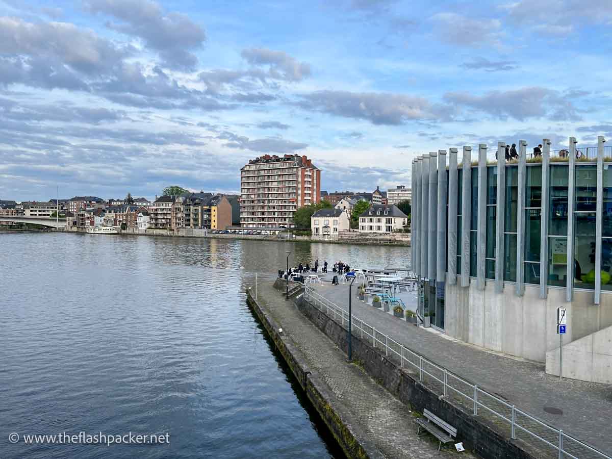 lalge modern building at the meeting point of 2 rivers