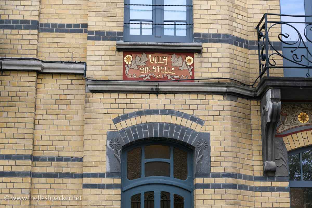 exterior of art nouveau building with a sign saying villa bagatelle