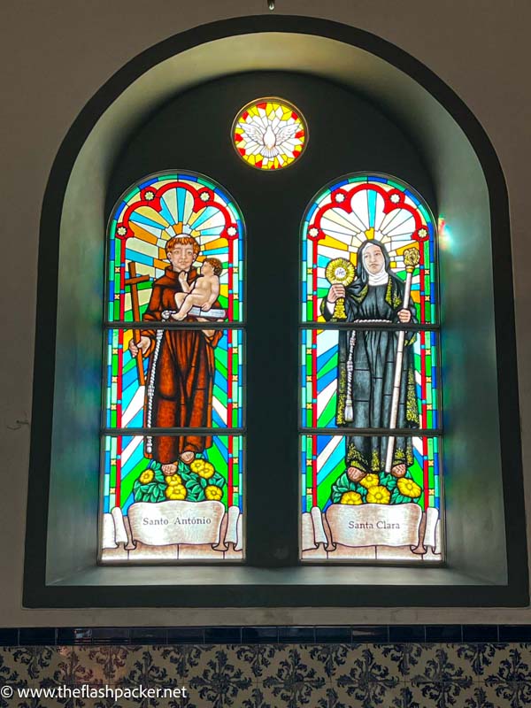 two stained glass windows in church