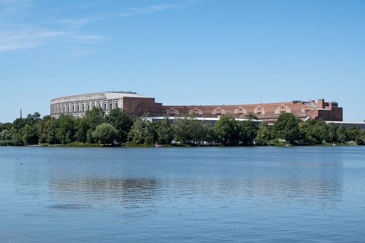 exterior of congress hall in nuremberg next to lake