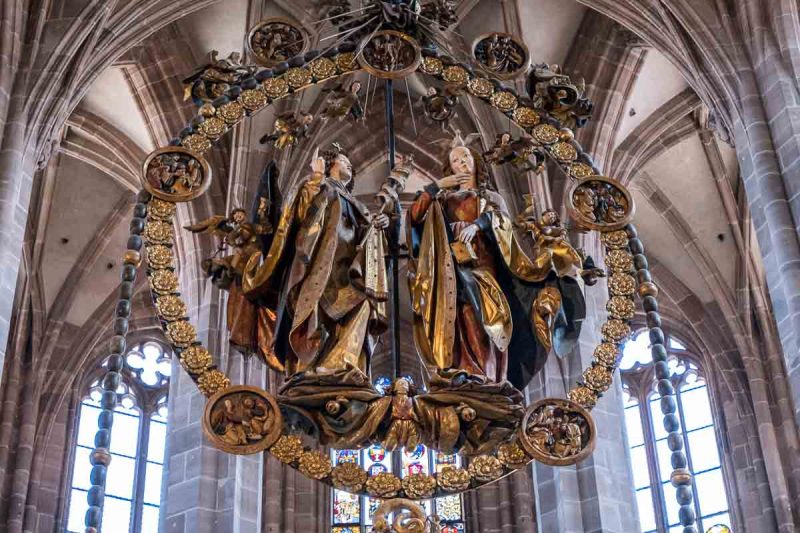 wooden sculpture of angel gabriel and mary