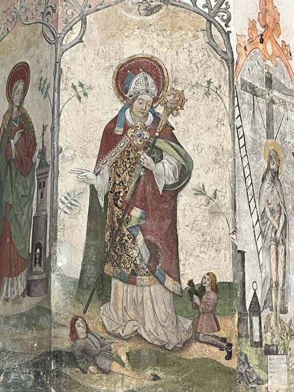 fresco of a bishop holding a sceptre