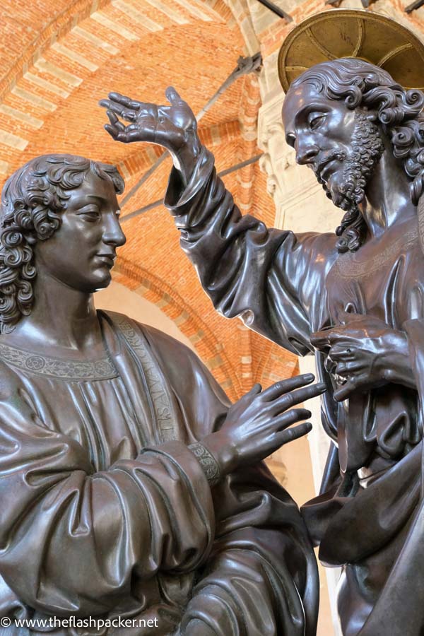 bronze sculpture in florence of christ and st thomas