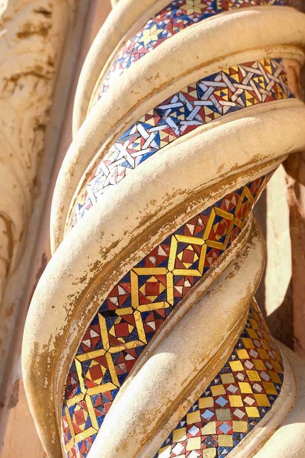 detail of coloured mosaics on stone spiral on outside of orvieto cathedral