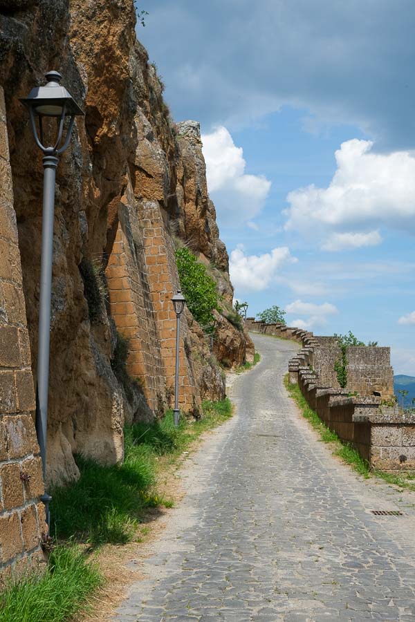 pretty pathway along the side of a city wall