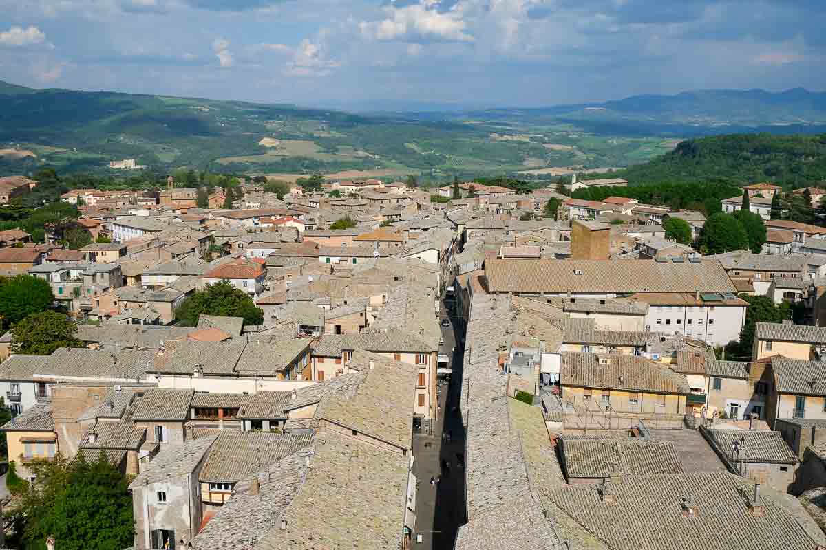 the rooftops of the town of orvieto and the umbrian countryside beyond